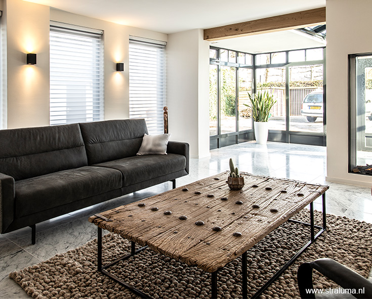 binnenkijken Bosschenhoofd woonkamer met design wandlampen woonkamer met design wandlampen